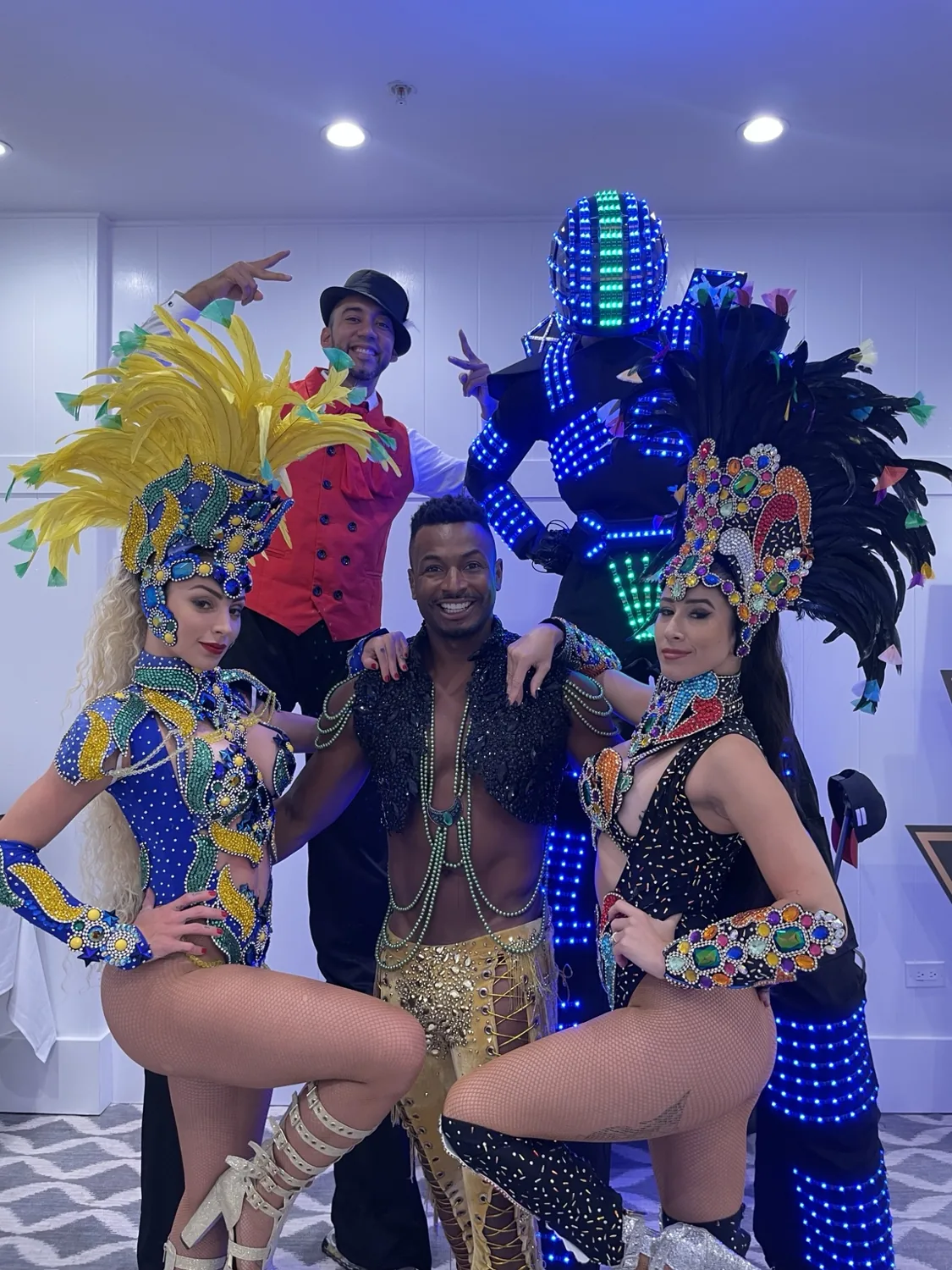 Samba dancers, LED robot and stilt walker available to customize your Hora Loca